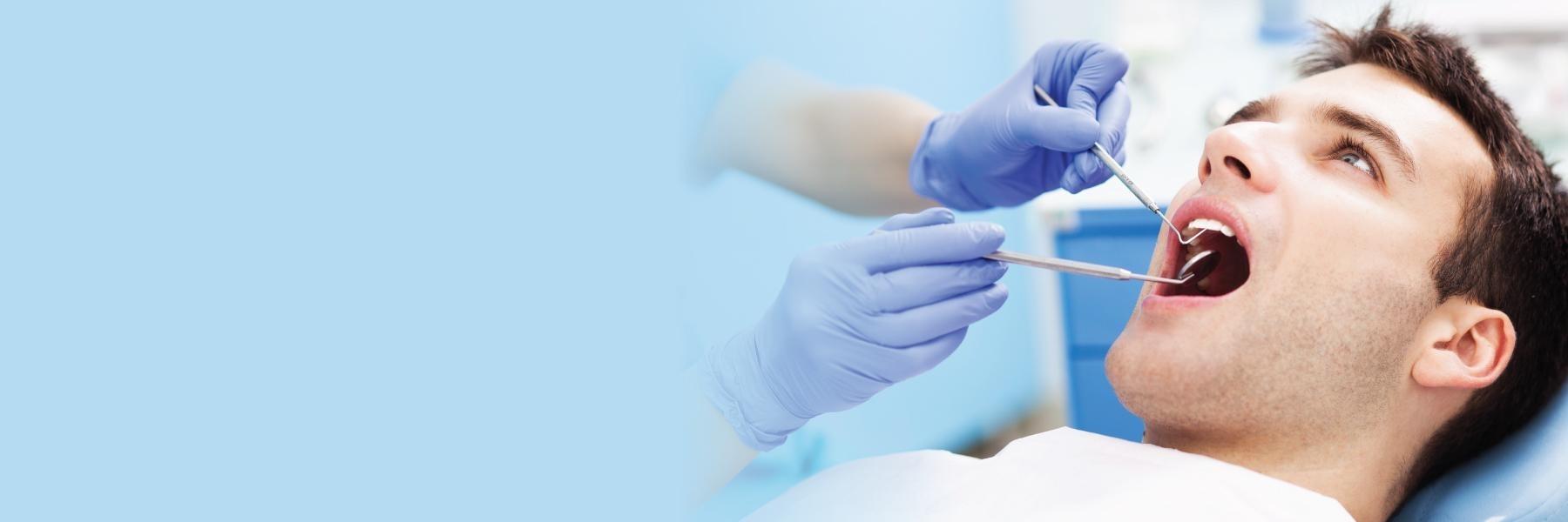 Patient getting dental exam at Springfield dentist office