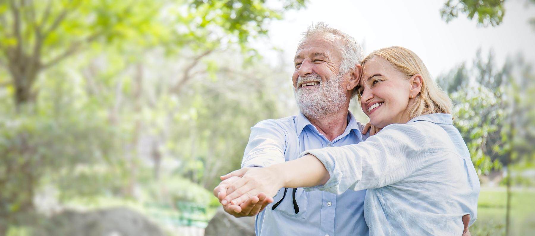 Married couple dancing and wearing dentures near Springfield IL